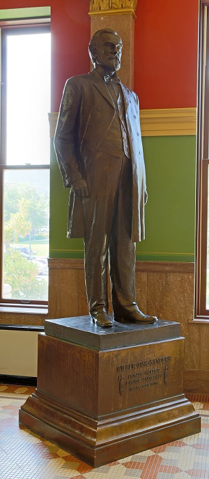 A bronze, life-sized statue of former Montana senator and founder of the Montana Historical Society, Wilbur Fisk Sanders.