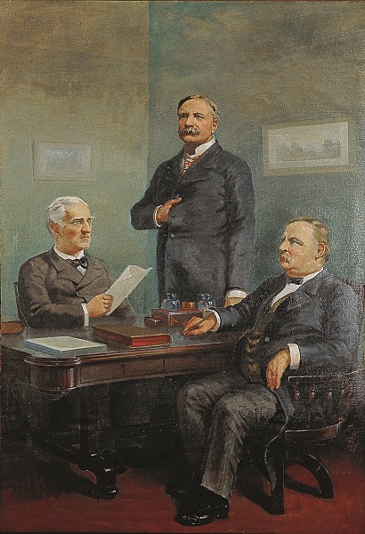 The painting "Signing of the Enabling Act," depicting the signing of the bill that later allowed Montana to become a state in 1889. Secretary of State Thomas Bayard sits on the left-hand side of the painting, holding the Act, while President Grover Cleveland stands in the center of the painting behind his desk. Montana's then-territorial delegate, Joseph K. Toole, sits on the right-hand side of the painting.