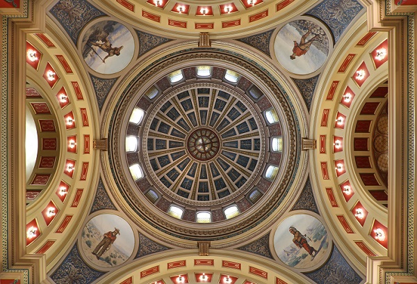 The Capitol Rotunda's ceiling, showing its artworks and ornamentation.